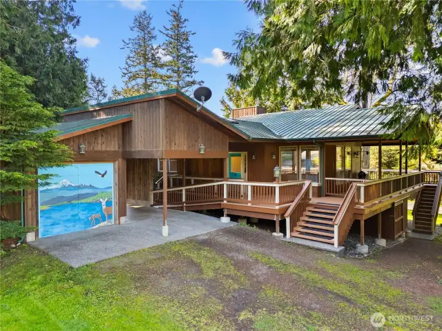 Driveway, carport and entry stairs.