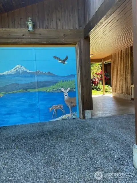 Garage and carport.  Handpainted very cool artwork.  So Guemes.