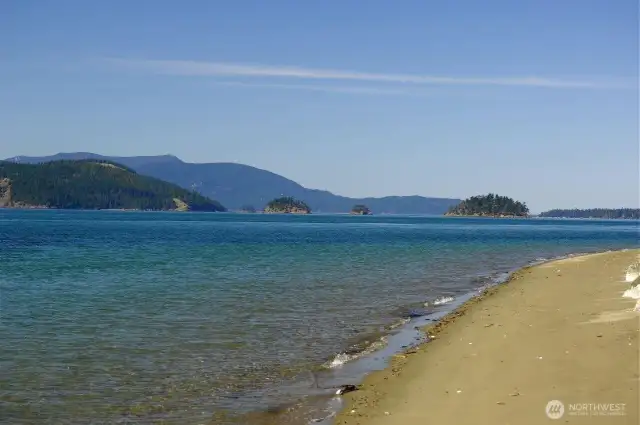 Shared beach access.    One of two beach access points.  Cypress Island     campgrounds just across the channel.