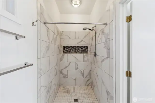 Marble and tile shower.