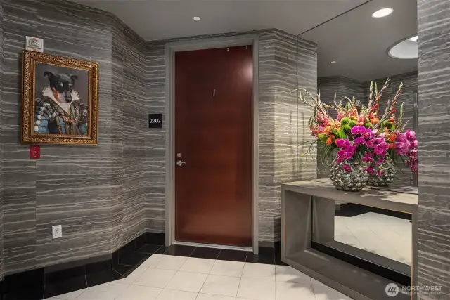 Located on the 22nd floor, this home is one of only a few select units in the building to feature a private vestibule entry—your elevator opens directly into your own foyer, offering a level of exclusivity and privacy rarely found in high-rise living.