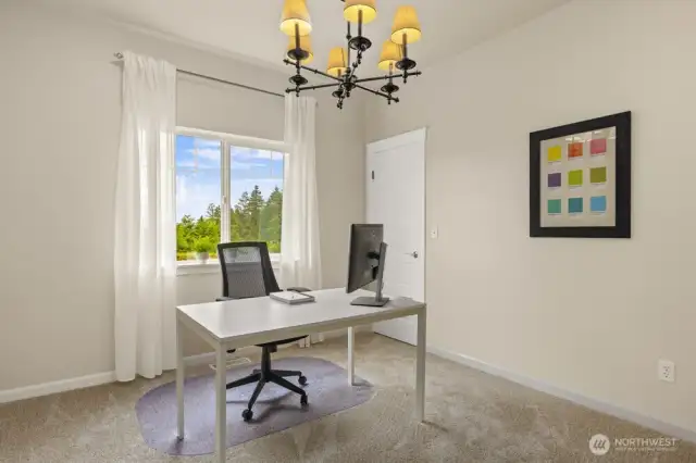 Bedroom #1, currently staged as an office. Did I mention, brand new carpet throughout the home?