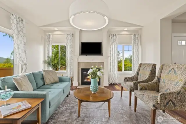 Ample windows and tall ceilings allow natural light to enhance the space.