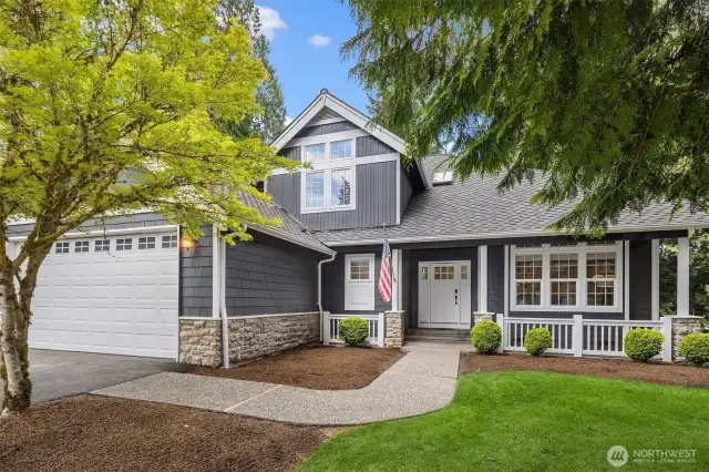 Ample driveway and welcoming pathway weave you to the entrance of this bright home.