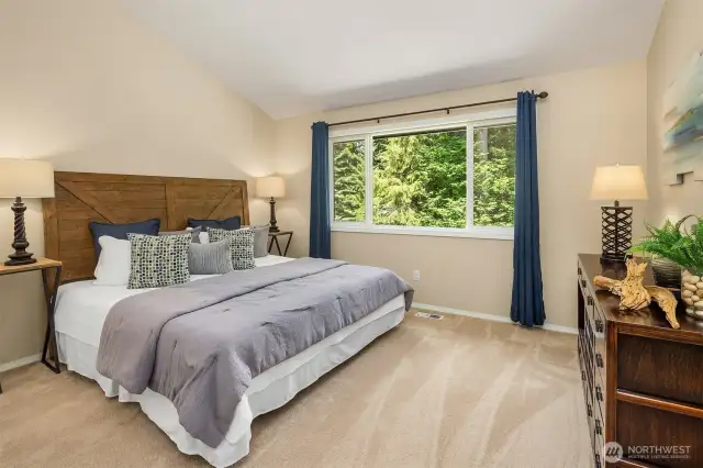 Primary en-suite with views of backyard.