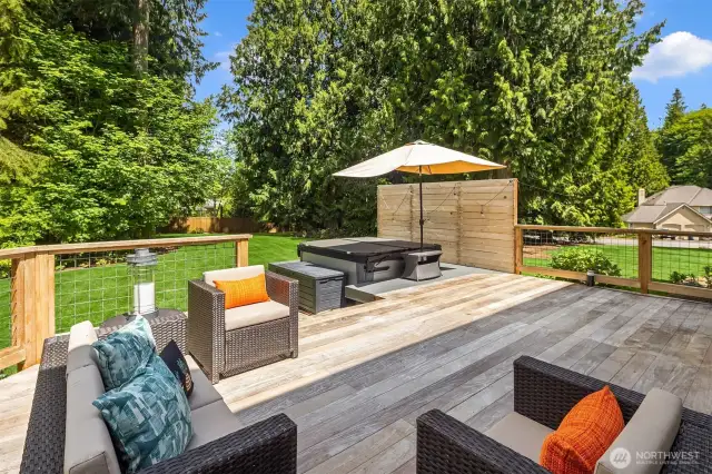 In this photo, you can see the new salt water Hot Springs spa for $25,000. Privacy wall, as well!