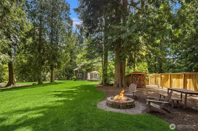 Firepit area and shop/shed are not easily seen from the house as they are a bit blocked by the trees.