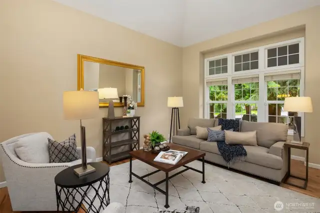 Throughout the home, extremely tall windows usher in sunlight.