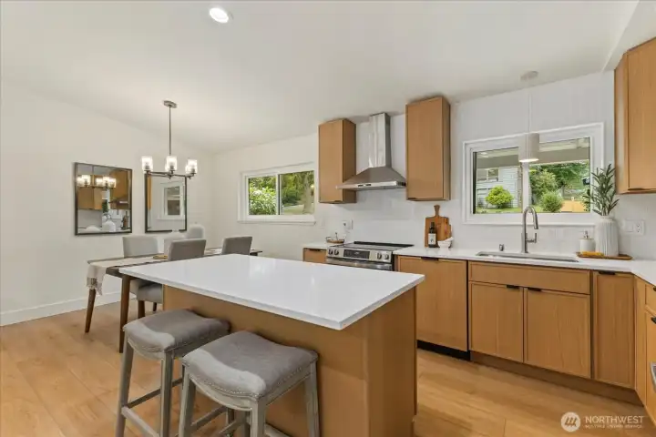 Open concept living, kitchen, dining area.
