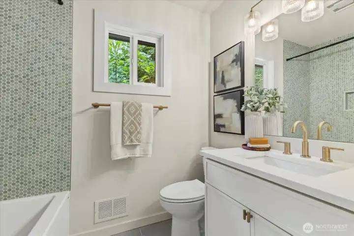 Hallway bathroom - completely remodeled with new tub and beautiful mosaic tiles.