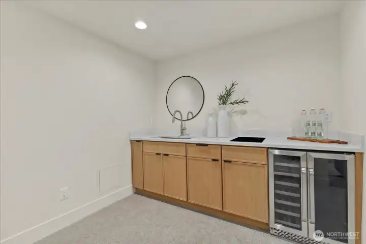 Downstairs bar/kitchenette, perfect for entertaining or extended living!