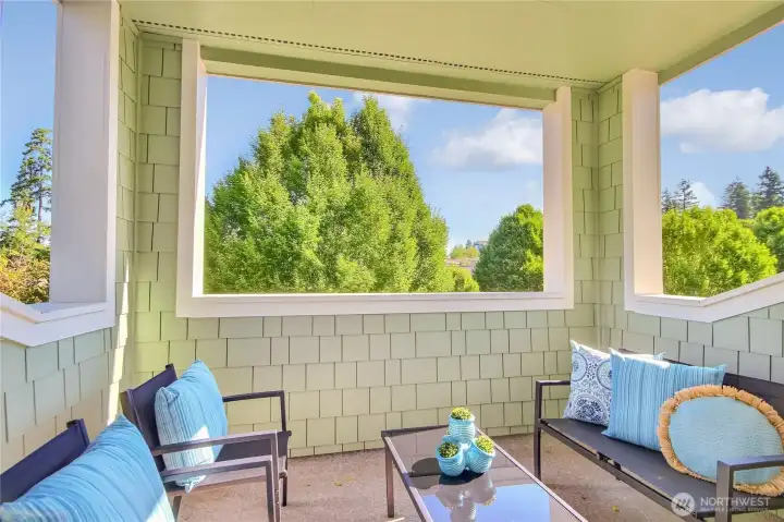 Step out of your living room and enjoy the seasons from this lovely covered deck. Al fresco dining, coffee, siesta, or bird watching, a great place to be.