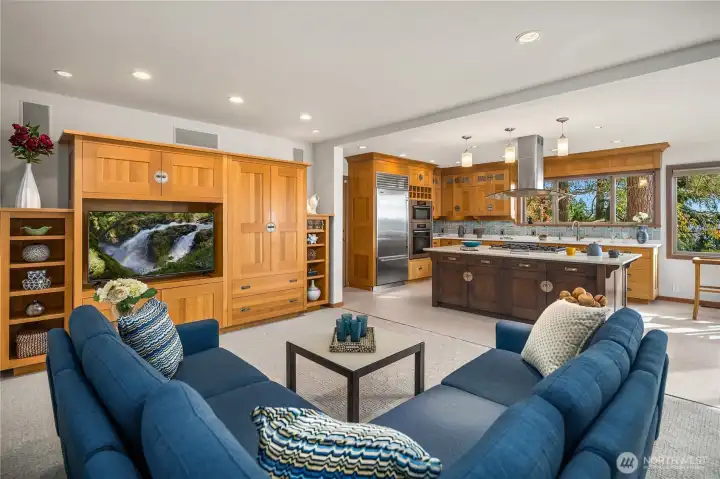 Family room right off kitchen with built-ins.