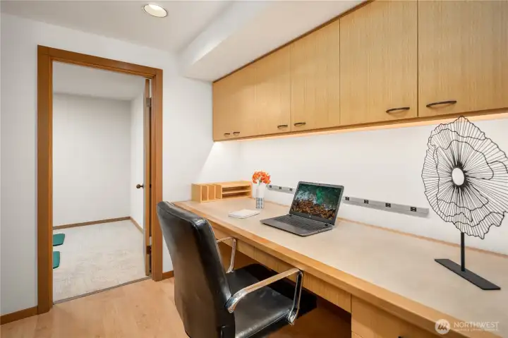 Lower office area with cabinets.