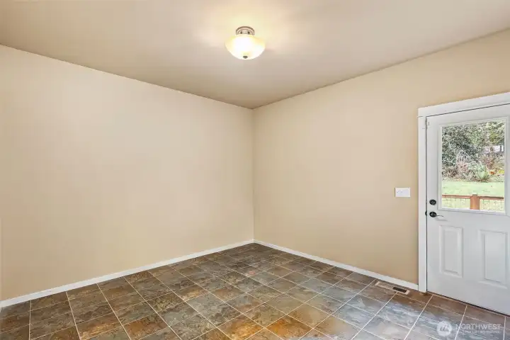 Mudroom off garage great work out space