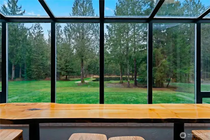 Enjoy your morning coffee at this kitchen bar while viewing nature!