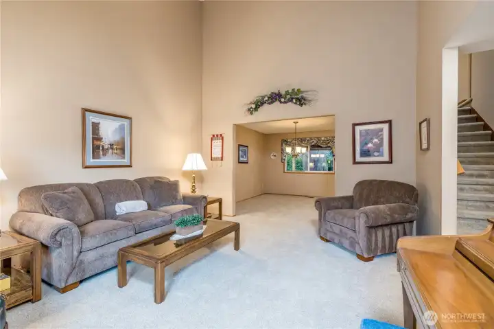 Living room flows to the formal dining room