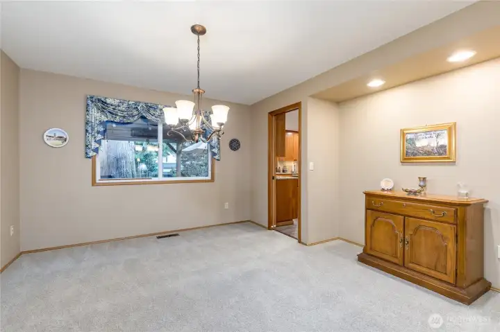 Formal dining room between kitchen and living room - great for entertaining
