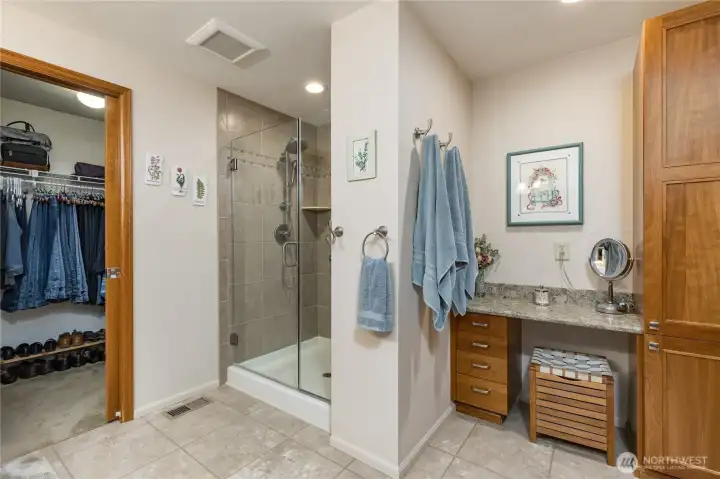 Remodel provided an enlarged shower, vanity and linen closet