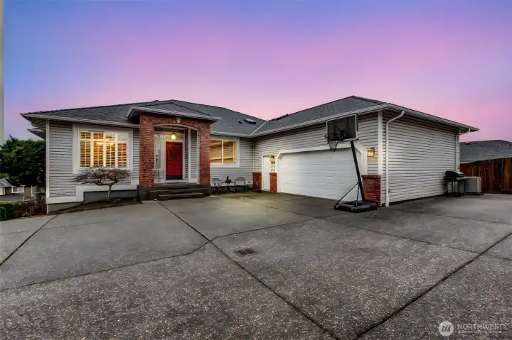 Up the driveway, you'll see the front entry and large 2 car garage! Check out all of the parking!