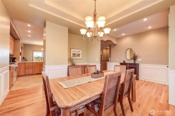 You're a hop, skip, and jump from the kitchen. Note the space for your buffet or china closet.