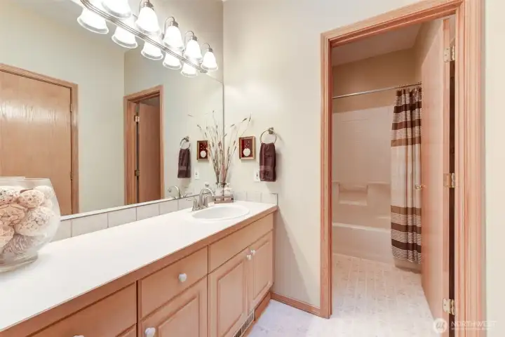 Main floor full bathroom is perfect for guests!