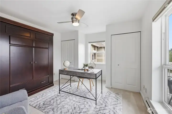 The second bedroom is perfect for an office/den or use it as a second bedroom. The built-in murphy bed is perfect for visiting guests!