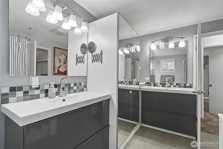 Primary bathroom with storage and 2 vanities