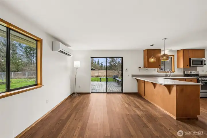 View from living room to back slider & kitchen, also an option for your dining table.