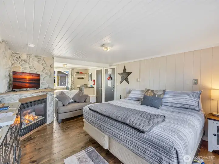 Comfortable sleeping space with beach-inspired design ideal for short term rental guests