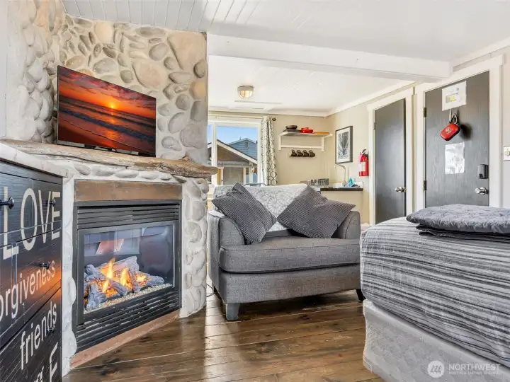 Cozy living area with fireplace perfect for relaxing after a day at the beach in Long Beach WA