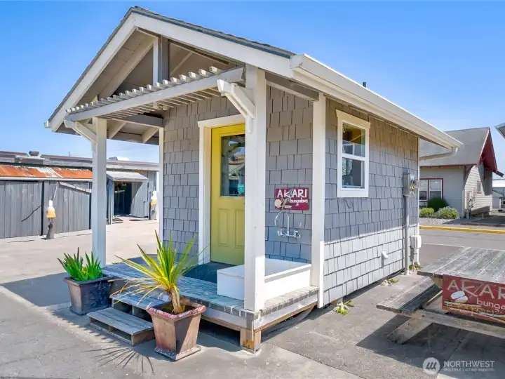 Additional storage building across the parking lot included. Laundry hookups and ample storage for beach gear or other supplies.