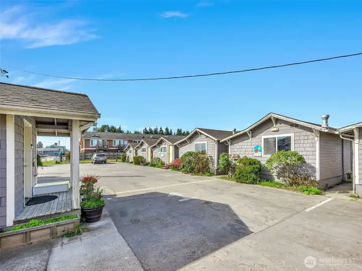 Additional storage building across the parking lot included. Laundry hookups and ample storage for beach gear or other supplies.