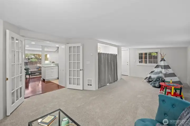 Large family room with several double-pane windows to let in all the light.  Access to backyard patio and yard.