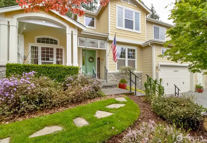 Front of home behind trees