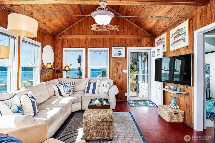 Living room with vaulted ceilings and views