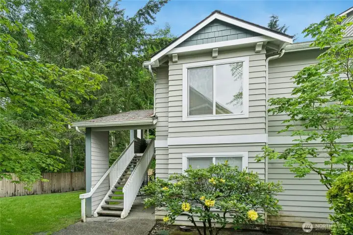 Lovely hushed setting, top floor unit, yet just up 1 floor!
