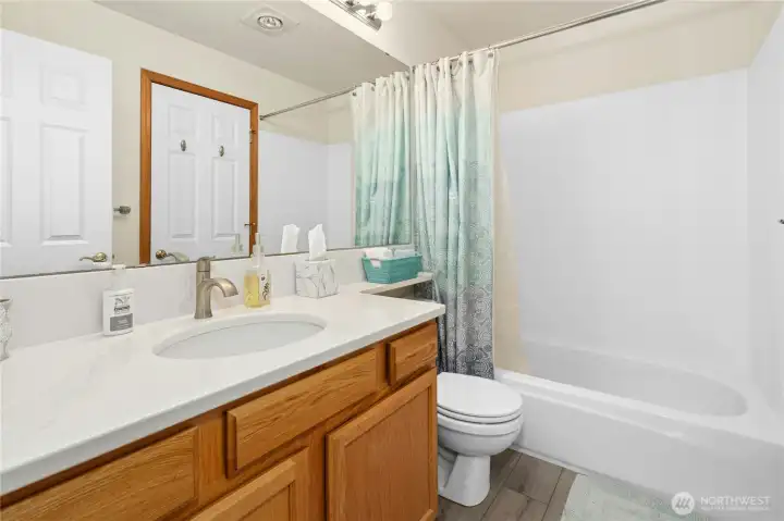 2nd bath, also with recent counters, faucet & flooring