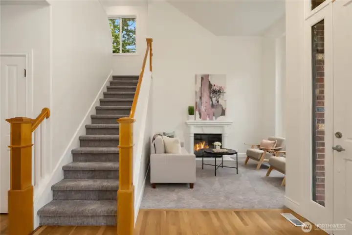 Entry to home with formal living to the right,.
