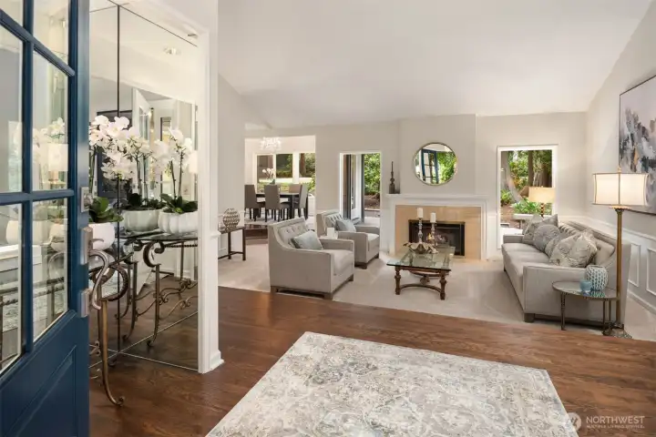 The entry sets the tone for this exceptional home, where warm hardwood floors flow throughout thoughtfully designed living spaces. The entry sets the tone for this exceptional home, where warm hardwood floors flow throughout thoughtfully designed living spaces.