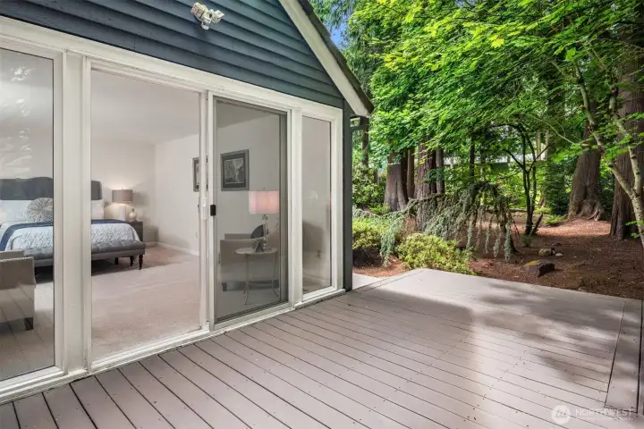 Off the primary bedroom you have direct access to the wraparound deck that spans the back of the home. Off the primary bedroom you have direct access to the wraparound deck that spans the back of the home.