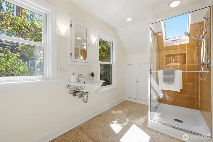 The upstairs 3/4 bath is large as well as bright and cheery!
