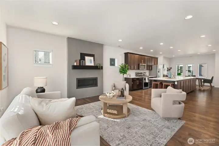 The open-concept layout seamlessly connects the dining area, kitchen, and living room, creating an ideal space for everyday living and entertaining. The open-concept layout seamlessly connects the dining area, kitchen, and living room, creating an ideal space for everyday living and entertaining.