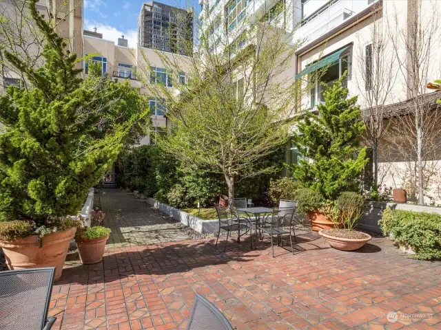 The Market Court Condominiums are most noted for their Award winning courtyard....  with plantings, sitting areas and fountain.  It is also a secret way to get to the Pike Place Market....