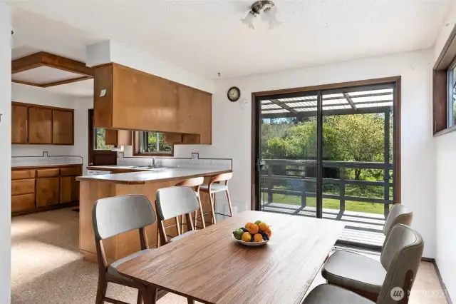 Dining area virtually staged.