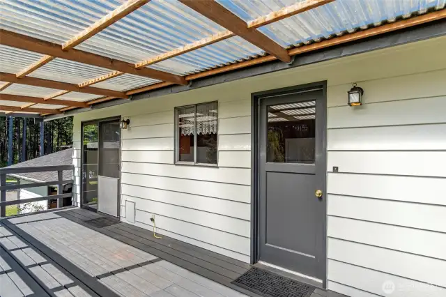 Covered deck outside of dining room and kitchen