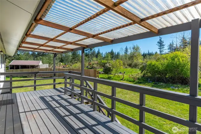 Covered deck looking at back of house