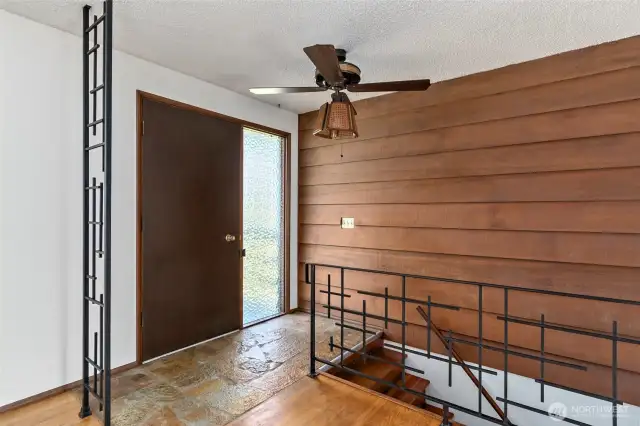 Entry way showing stairs to lower level.