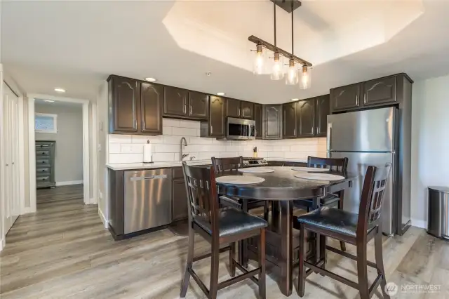 Apartment kitchen. Double doors on left are the laundry closet.