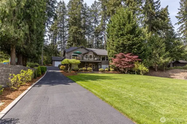 Well-maintained park-like property with underground sprinkler system